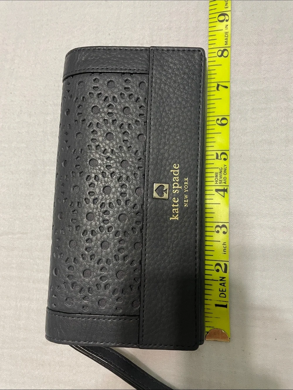 kate spade Black Textured Leather Wristlet Clutch with Gold Logo